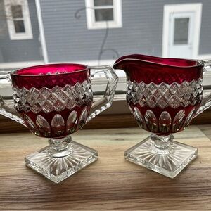 Elegant Red and Clear Glass Creamer and Sugar Set. Signed.